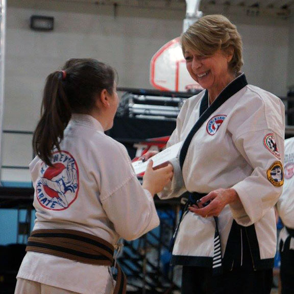 Kinney Karate instructor with student